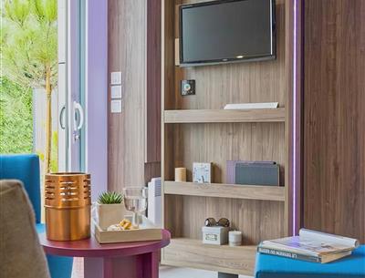 Cottage TAOS avec SPA privatif 5 personnes - 40m² - Camping Airotel 4* La Roseraie La Baule luxe ultra confort espace deux salles de bain terrasse semi-couverte équipement moderne presqu'ile Loire Atlantique